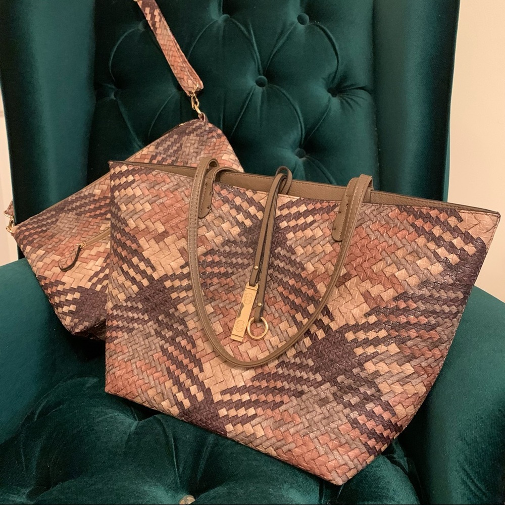 Lou Lou vegan leather tote set with removable zip up pouch and shoulder strap.